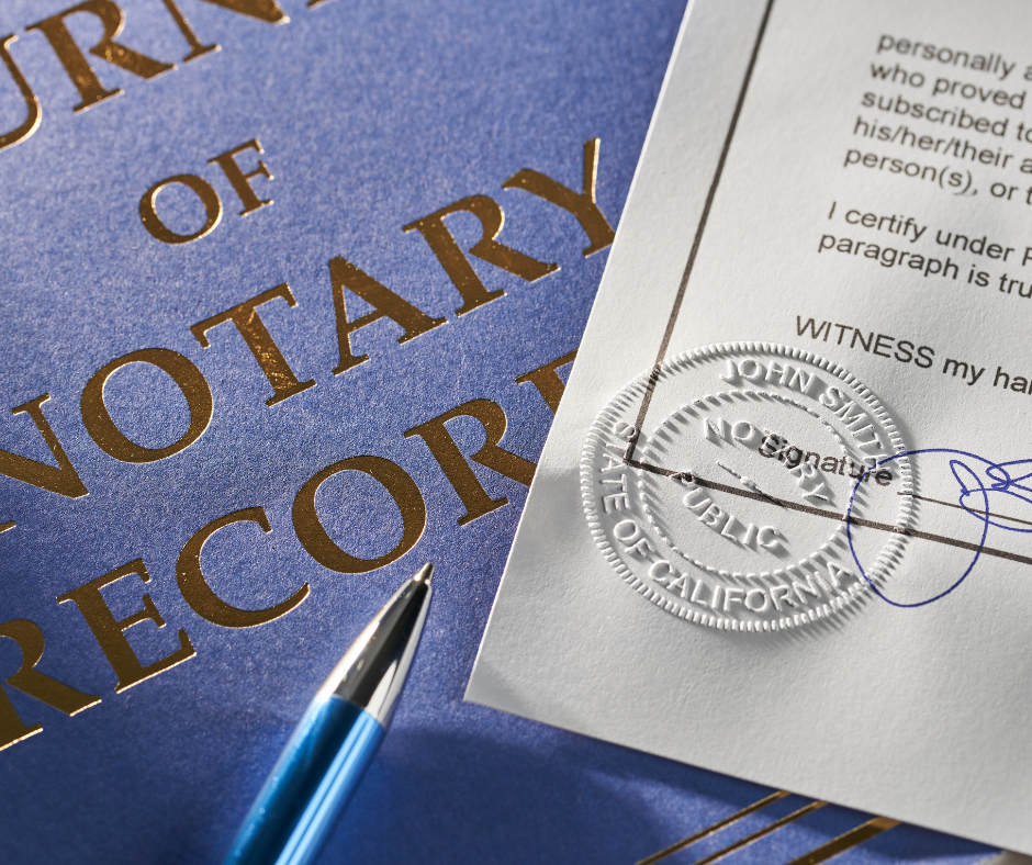 Notary journal and document with embossed seal and pen.