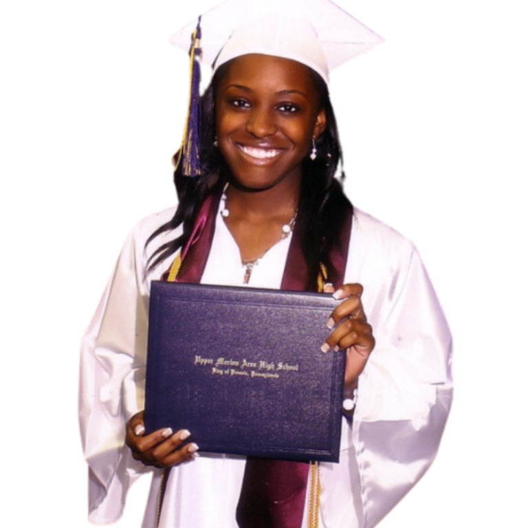Jessica A. Moore smiling in a white graduation cap and gown, holding her high school diploma.